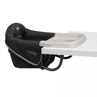 Black baby booster seat with gray accents and white tray